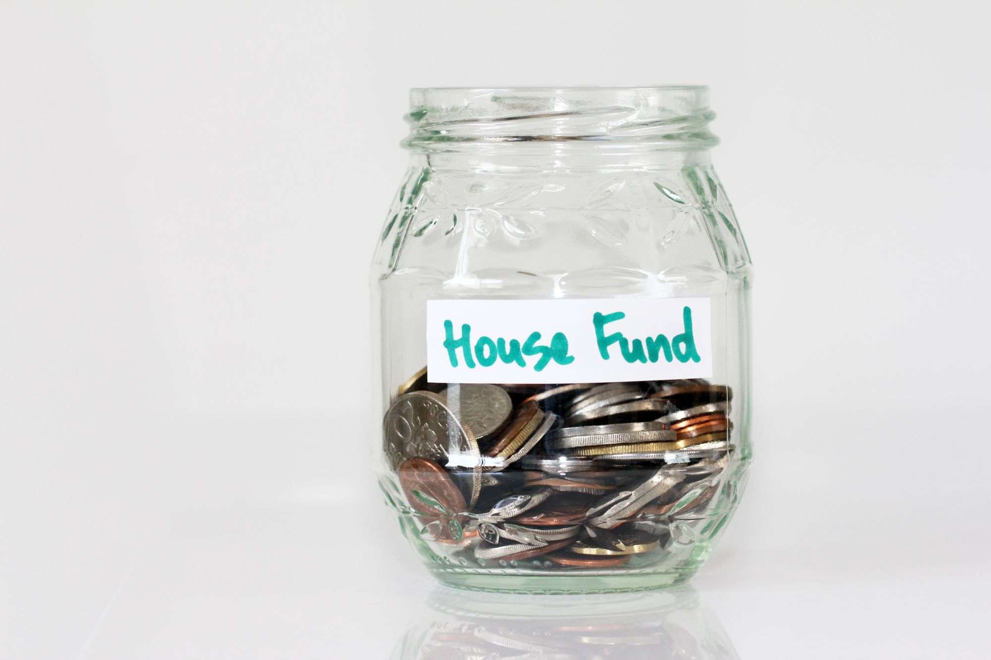 Glass-Money-Jar-with-Loose-Change-Inside-and-House-Fund-Label